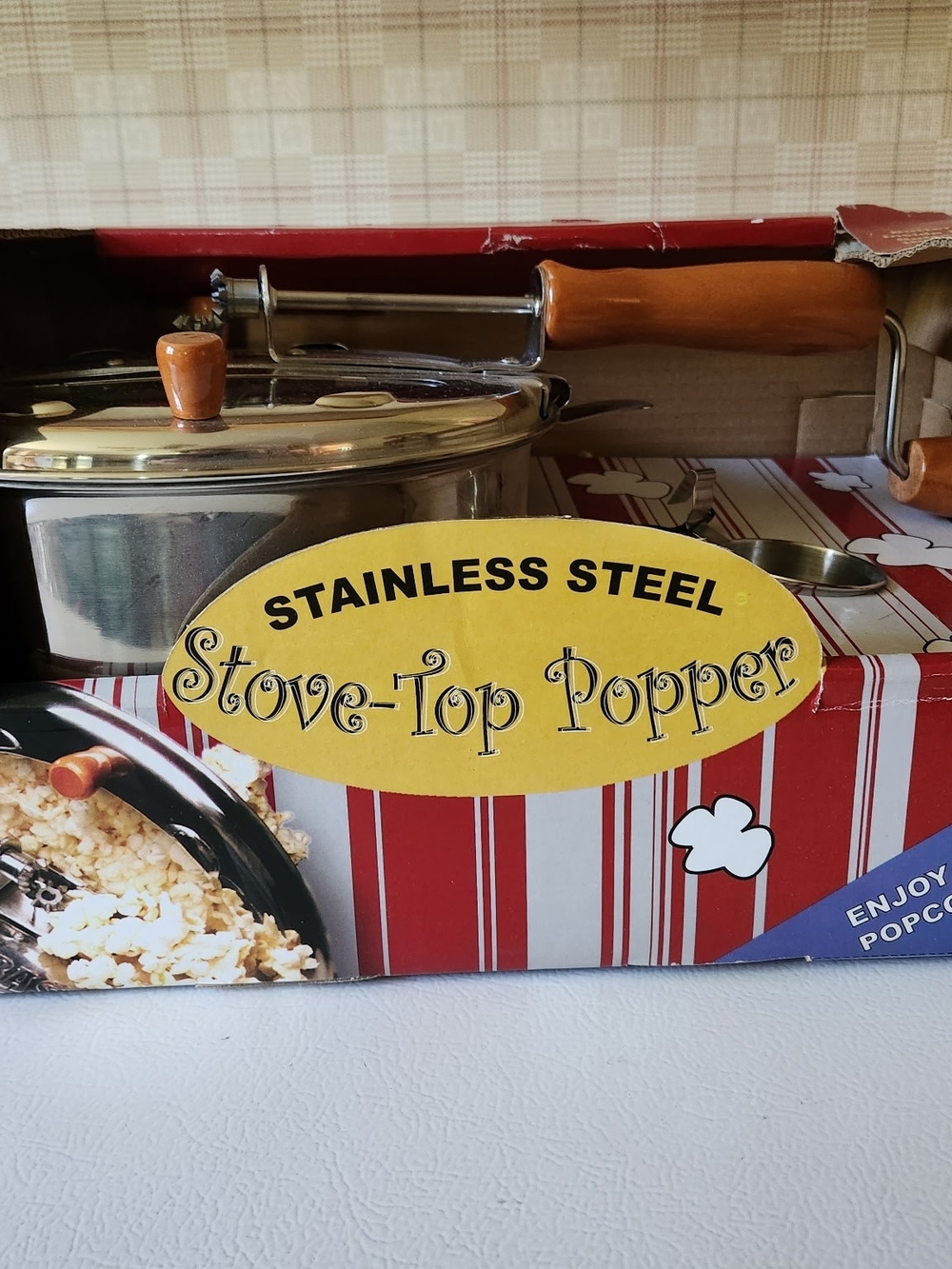 Stainless Steel Stove-Top Popper with Brown Wooden Handle